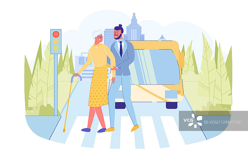 男人帮助老妇人在绿灯下过马路图片素材