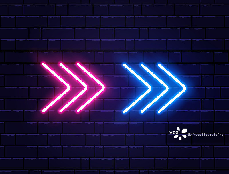 砖墙上的箭头霓虹灯图片素材