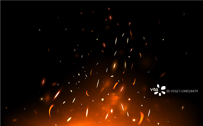 深色背景上的火焰火花和粒子图片素材