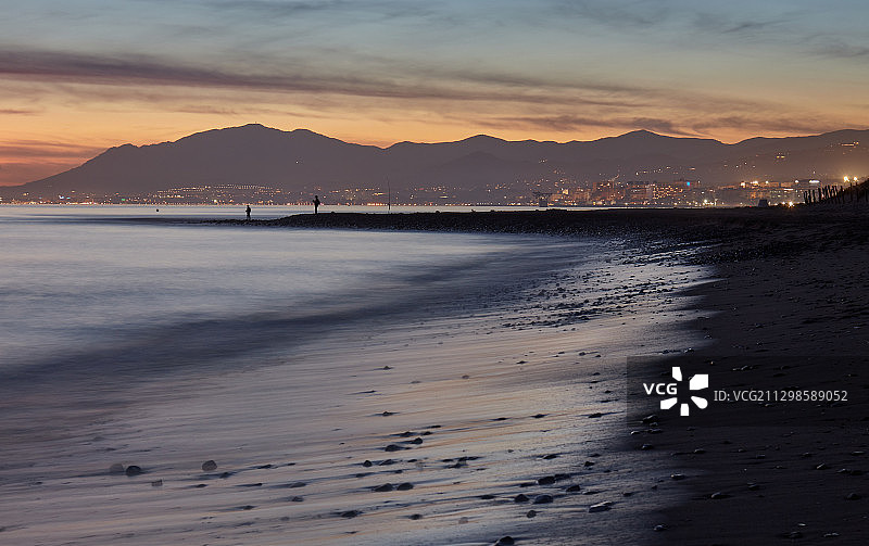 西班牙马贝拉海滩日落美景图片素材