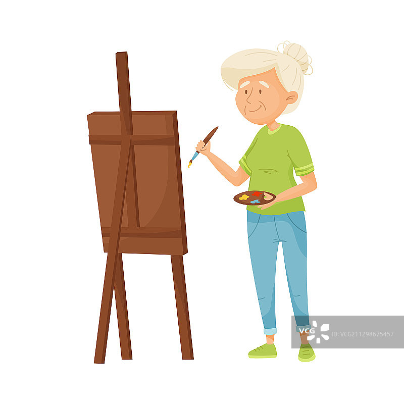 灰发老年妇女用颜料绘画图片素材