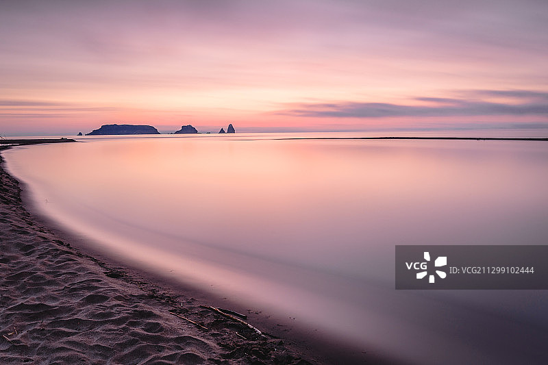 西班牙埃斯卡拉海滩日落美景图片素材