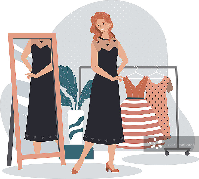 在时装店试穿新裙子的女人图片素材
