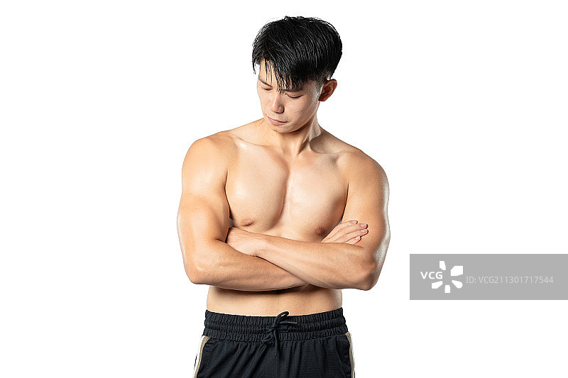 纯色背景里的健身肌肉男孩图片素材