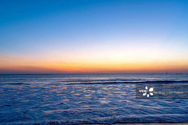 印度尼西亚巴厘岛金巴兰沙滩落日图片素材