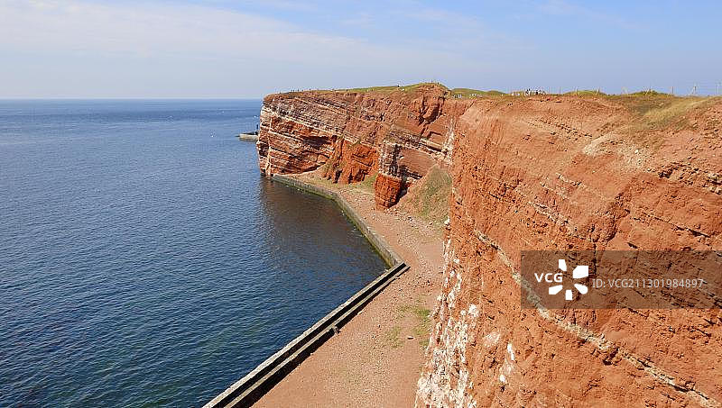 黑尔戈兰岛红色沉积岩景观，德国石勒苏益格-荷尔斯泰因州图片素材