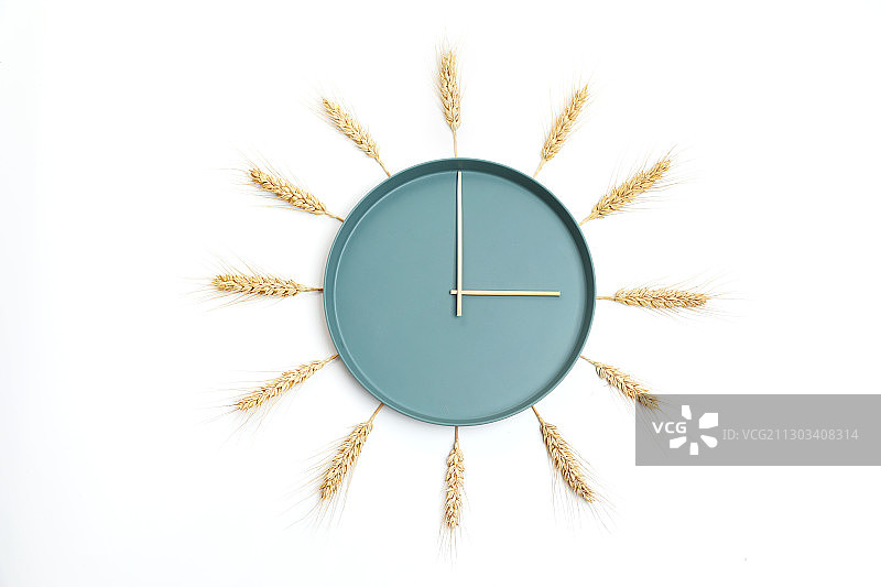麦穗与圆盘组成的创意时钟图片素材
