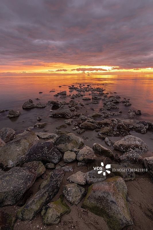 意大利拉齐奥利多迪奥斯蒂亚的日落海景图片素材