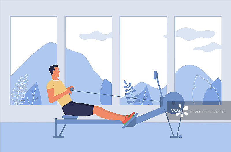 男子在健身房使用划船模拟器图片素材