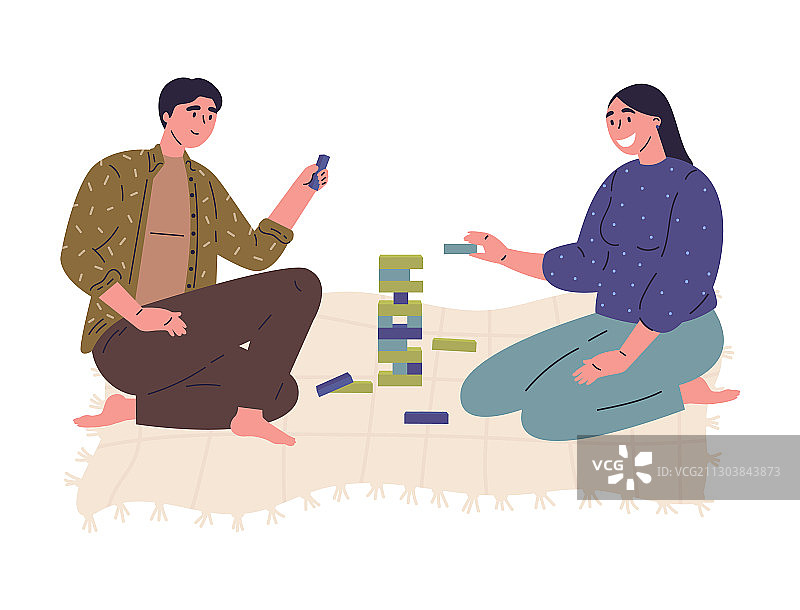 年轻男人和女人玩积木游戏图片素材