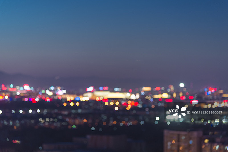 夜晚城市地平线灯光霓虹灯虚化背景图图片素材