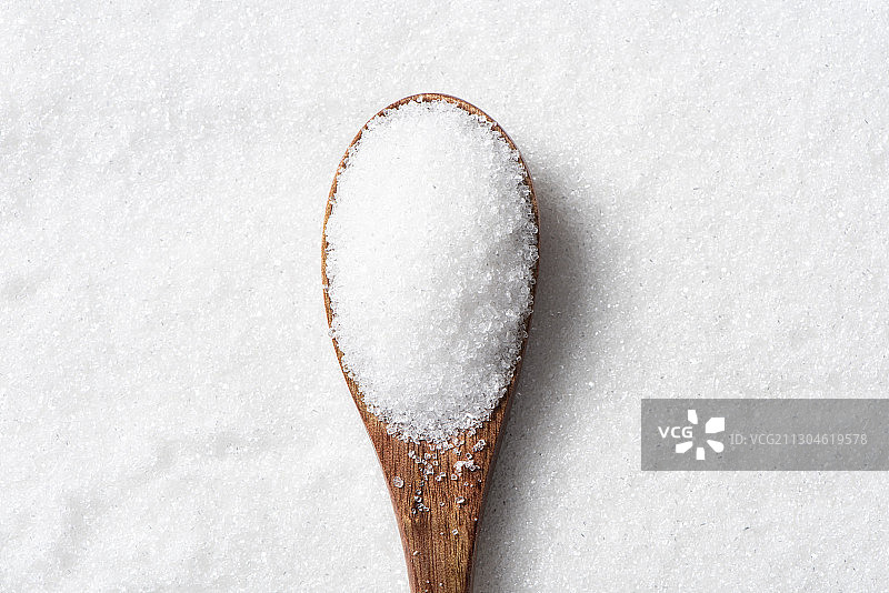 木勺里的白砂糖图片素材