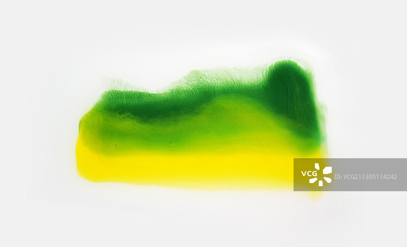 黄绿色流动的颜料肌理图案图片素材