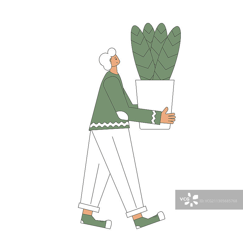 手捧室内盆栽的男人图片素材