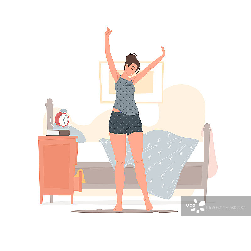 快乐的年轻女人在早晨醒来图片素材