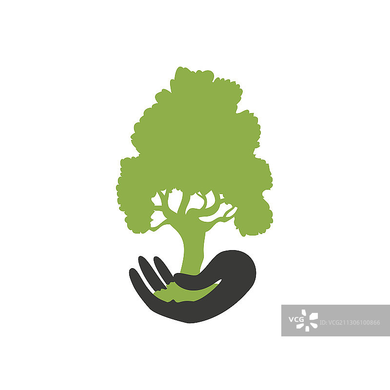 手持绿树的生态环保概念图片素材