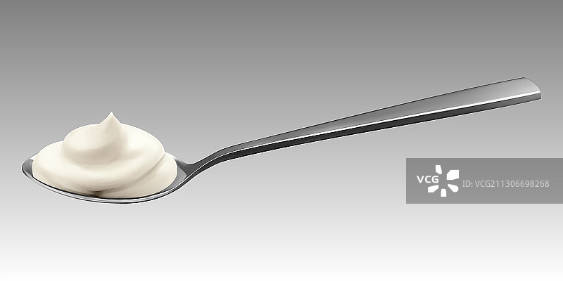 金属勺上的酸奶或奶油写实风格图片素材