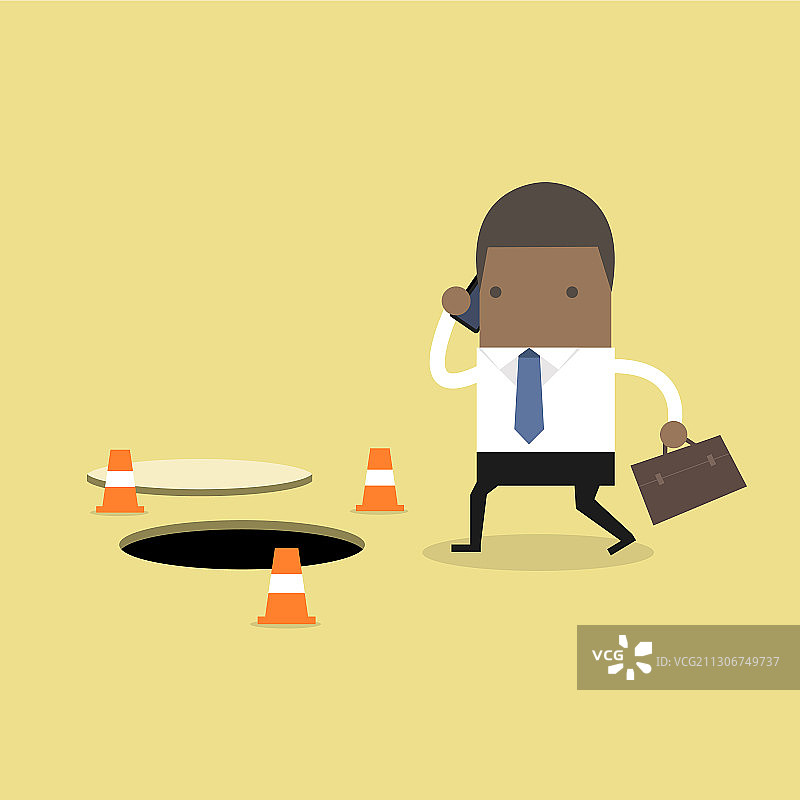 站在地面坑洞旁的非洲商人图片素材