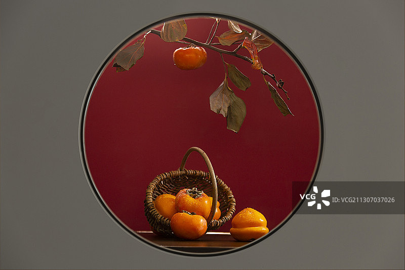 创意圆形透景柿子静物图片素材