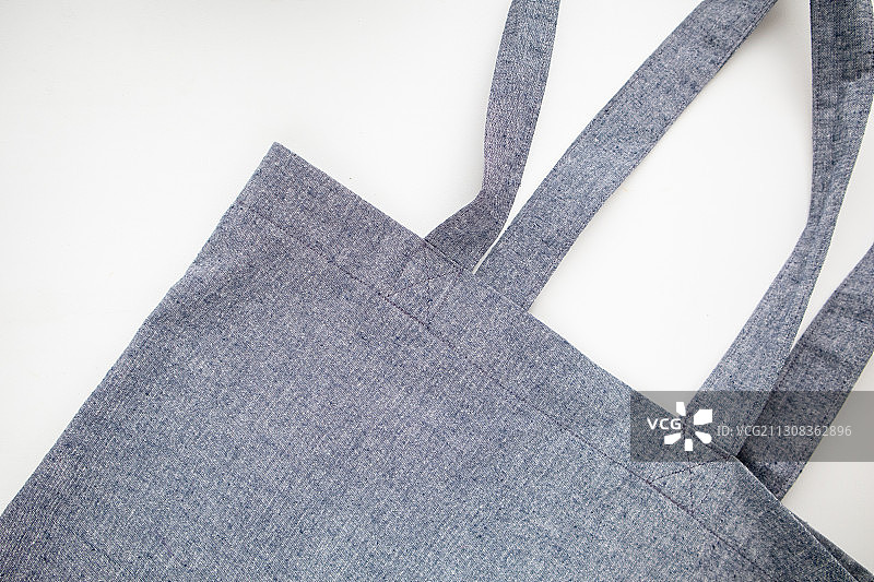 蓝色环保帆布手提购物袋图片素材