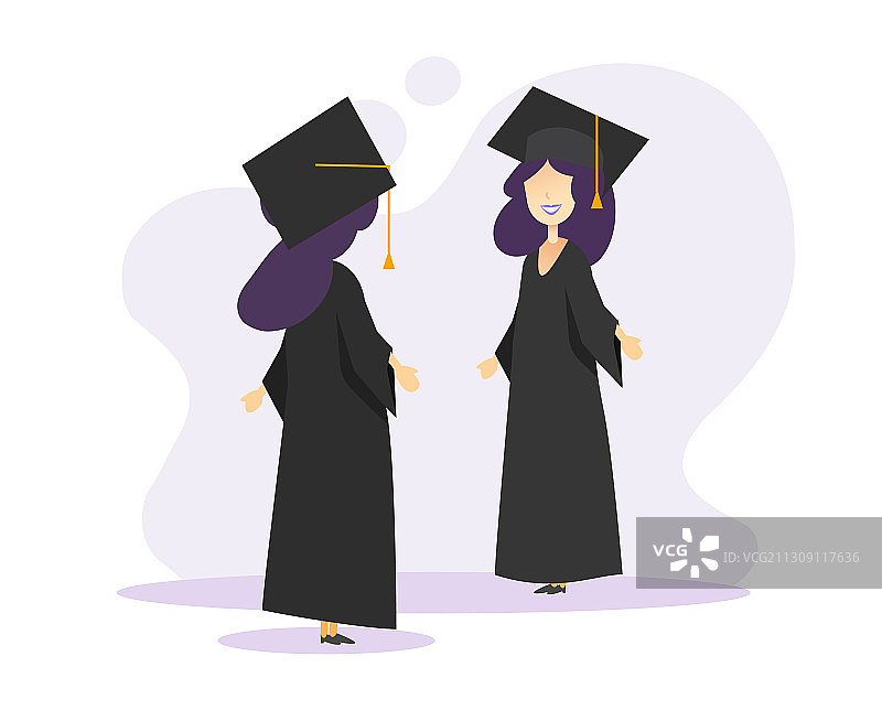 穿着礼服和帽子交谈的毕业学生图片素材
