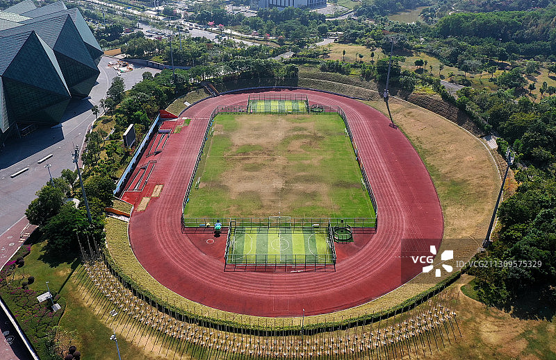 广东省深圳市龙岗区大运体育中心体育馆操场航拍图片素材