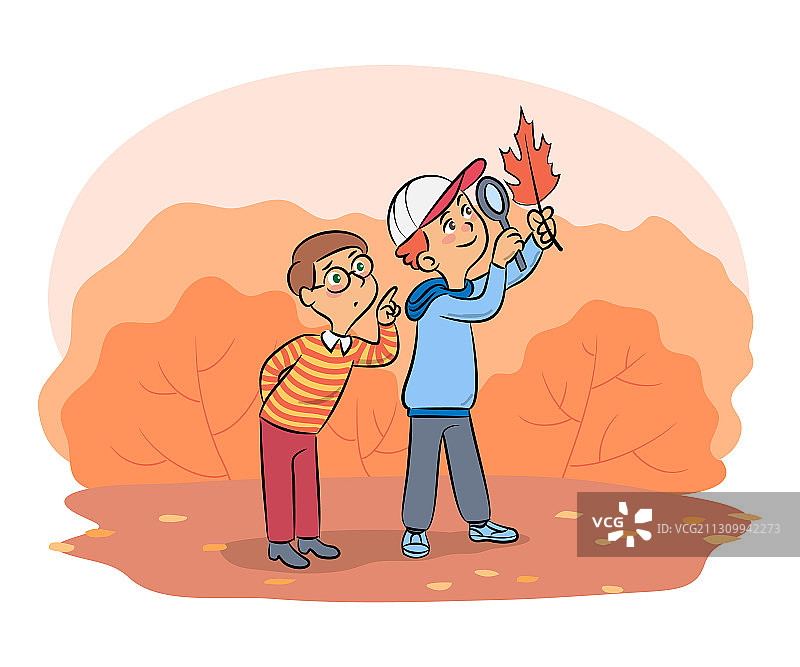 学龄前儿童用放大镜探索树叶图片素材