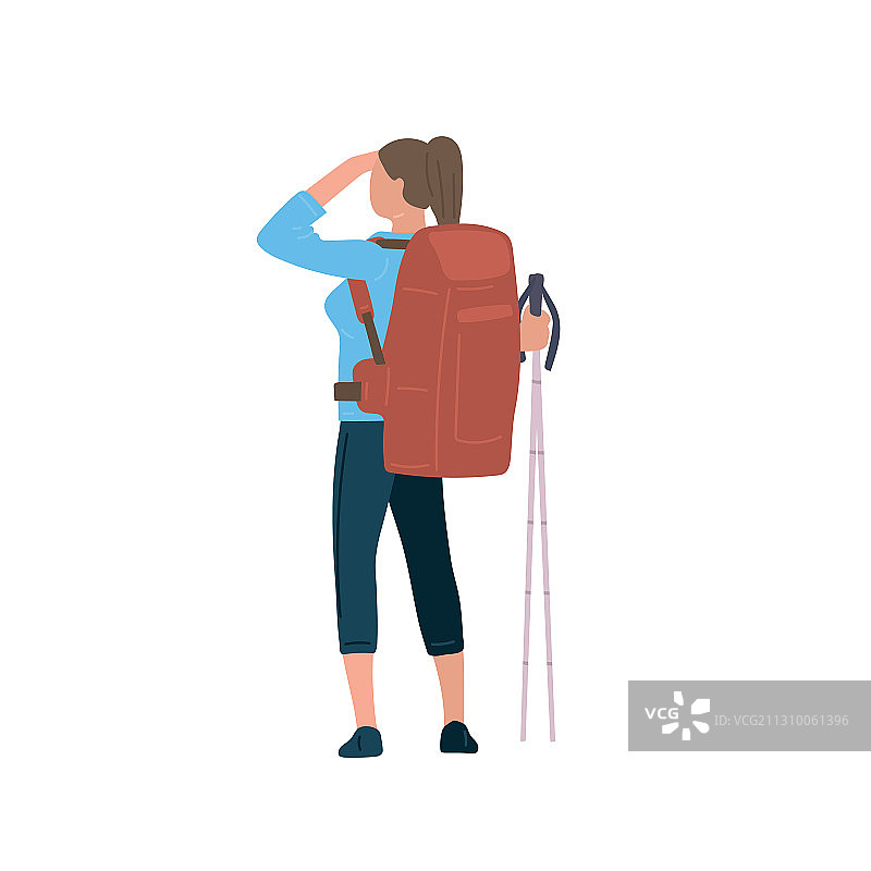 背着徒步背包、拿着登山杖的女人图片素材
