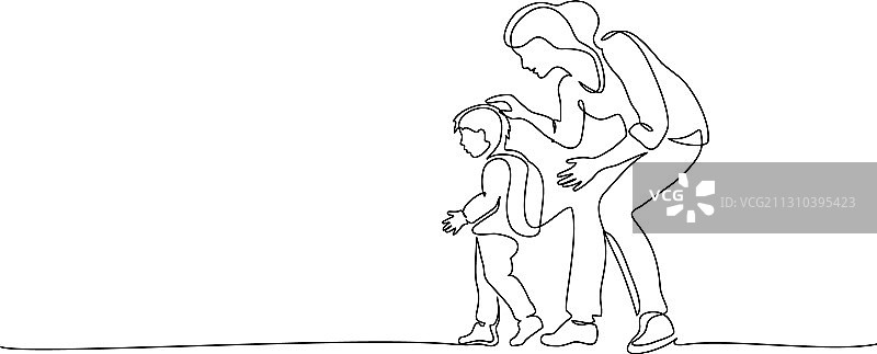 母亲送儿子上一年级图片素材