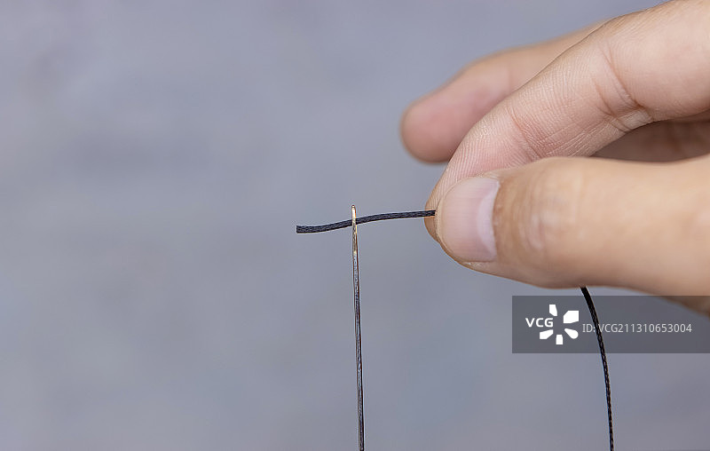 穿针引线图片素材