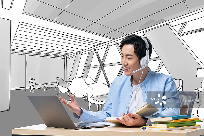 年轻男子使用电脑图片素材