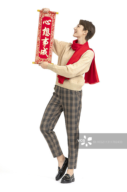 手拿春晖的年轻西方女性图片素材