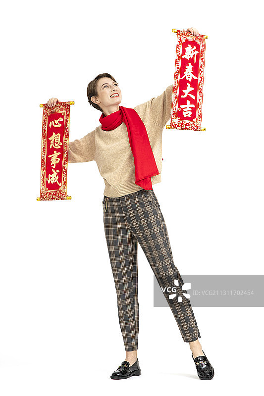 手拿春晖的年轻西方女性图片素材