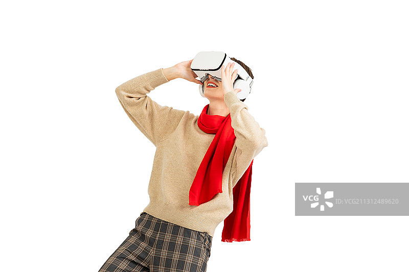 头戴VR的年轻女性图片素材