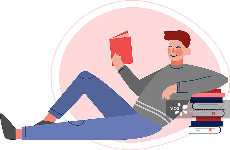 男子坐在地板上读书图片素材