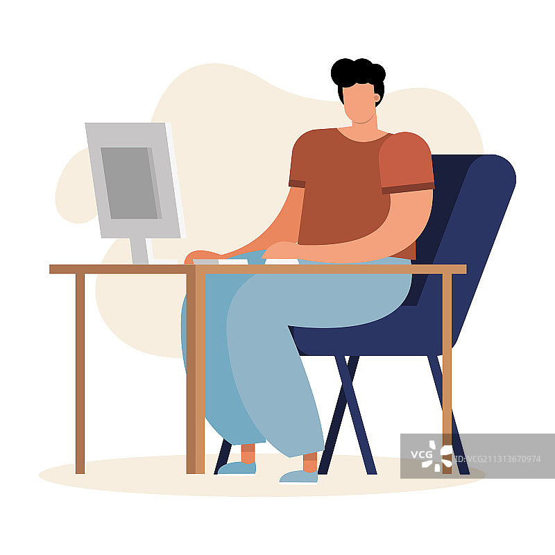 青年男子在家中使用台式电脑工作图片素材