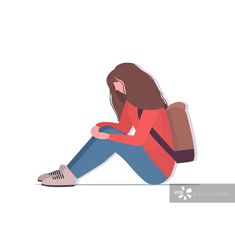 背着书包哭泣的沮丧女学生图片素材
