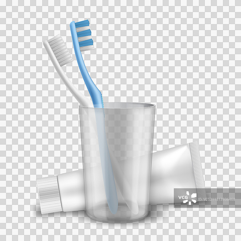 杯子附近的白色和蓝色牙刷图片素材