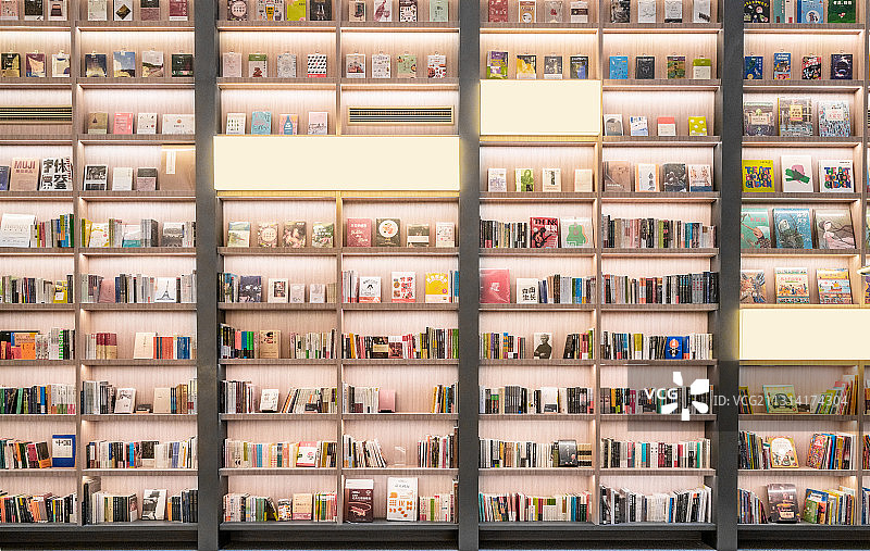 一面整齐的图书馆书籍背景墙图片素材