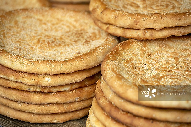 新疆地方特色小吃美食烤馕饼图片素材