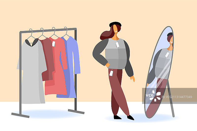 女人在秋季购物时试穿衣服图片素材