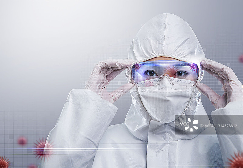 穿防护服的年轻女医生图片素材