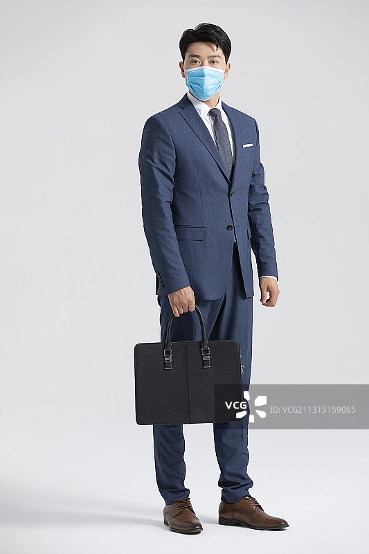 商务男士戴着口罩图片素材