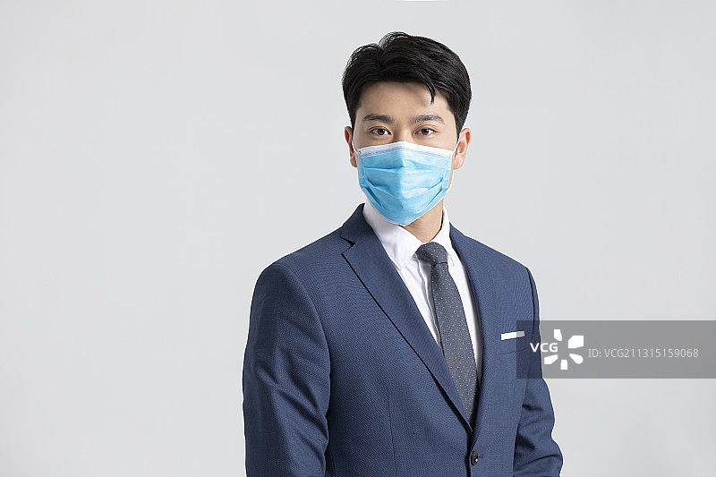 商务男士戴着口罩图片素材