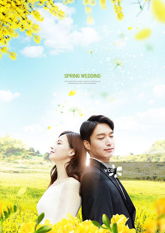 被黄色鲜花簇拥的新娘新郎图片素材
