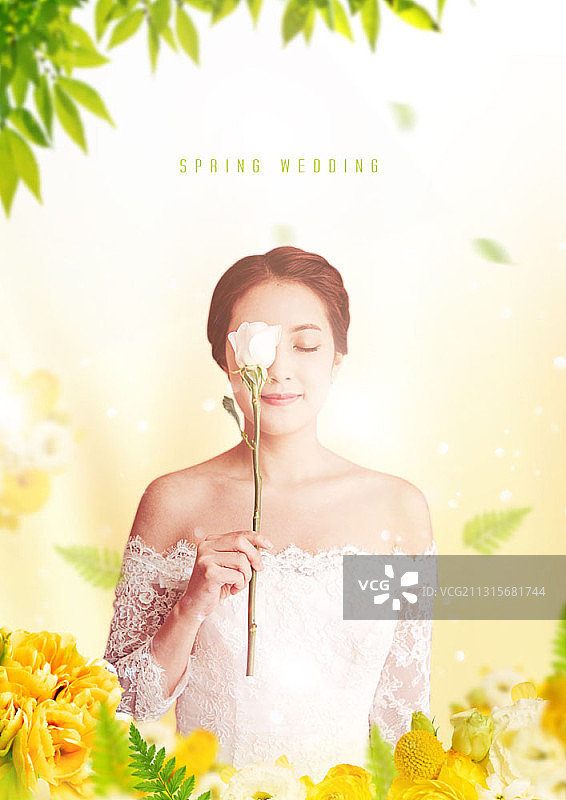 新娘拿着一支白色玫瑰花图片素材