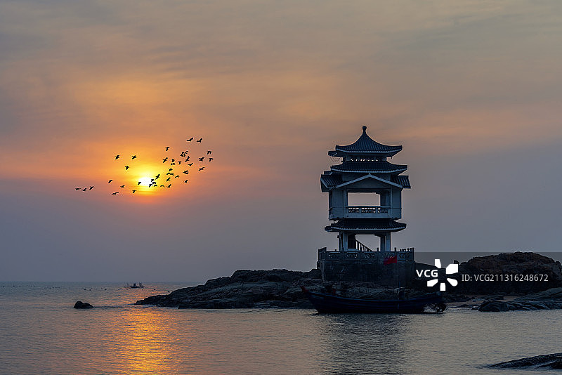 中国辽宁葫芦岛兴城海滨三礁揽胜日出图片素材