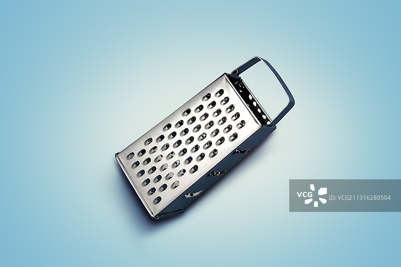 蓝色背景上的擦菜板图片素材