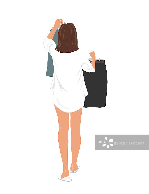 年轻漂亮的女人挑选衣服图片素材