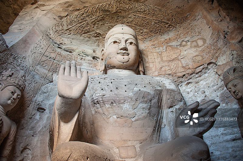 山西大同世界文化遗产5A级旅游景区云冈石窟洞窟佛像仰拍特写图片素材